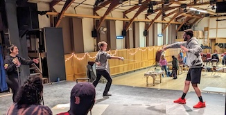 Shira directing stage combat at Concord Players